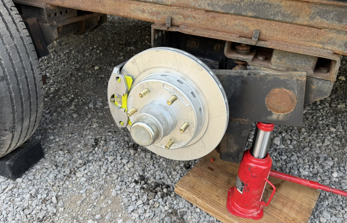 RV wheel and brake maintenance in progress